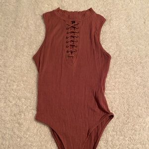 Mock Neck Ribbed Body suit Size Lg but fits tight